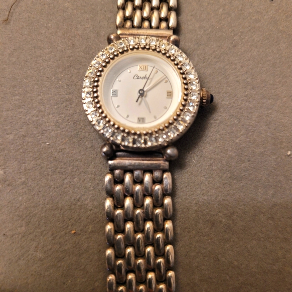 Womens silver cz surrounding face watch